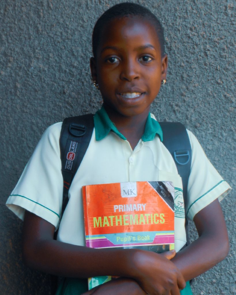 one of our beneficiaries. At Cosma we get children from vulnerable homes and give them an opportunity to go to school.